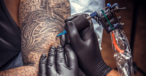Зморщені від болю, але щасливі. В Києві відбувся фестиваль Tattoo Collection